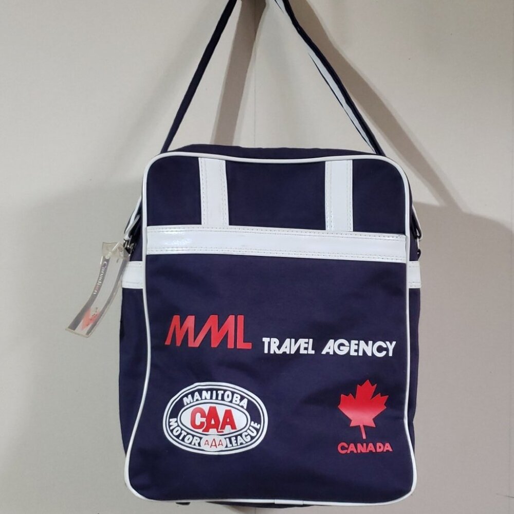 vintage navy blue red white branded CAA carry on luggage bag with shoulder strap